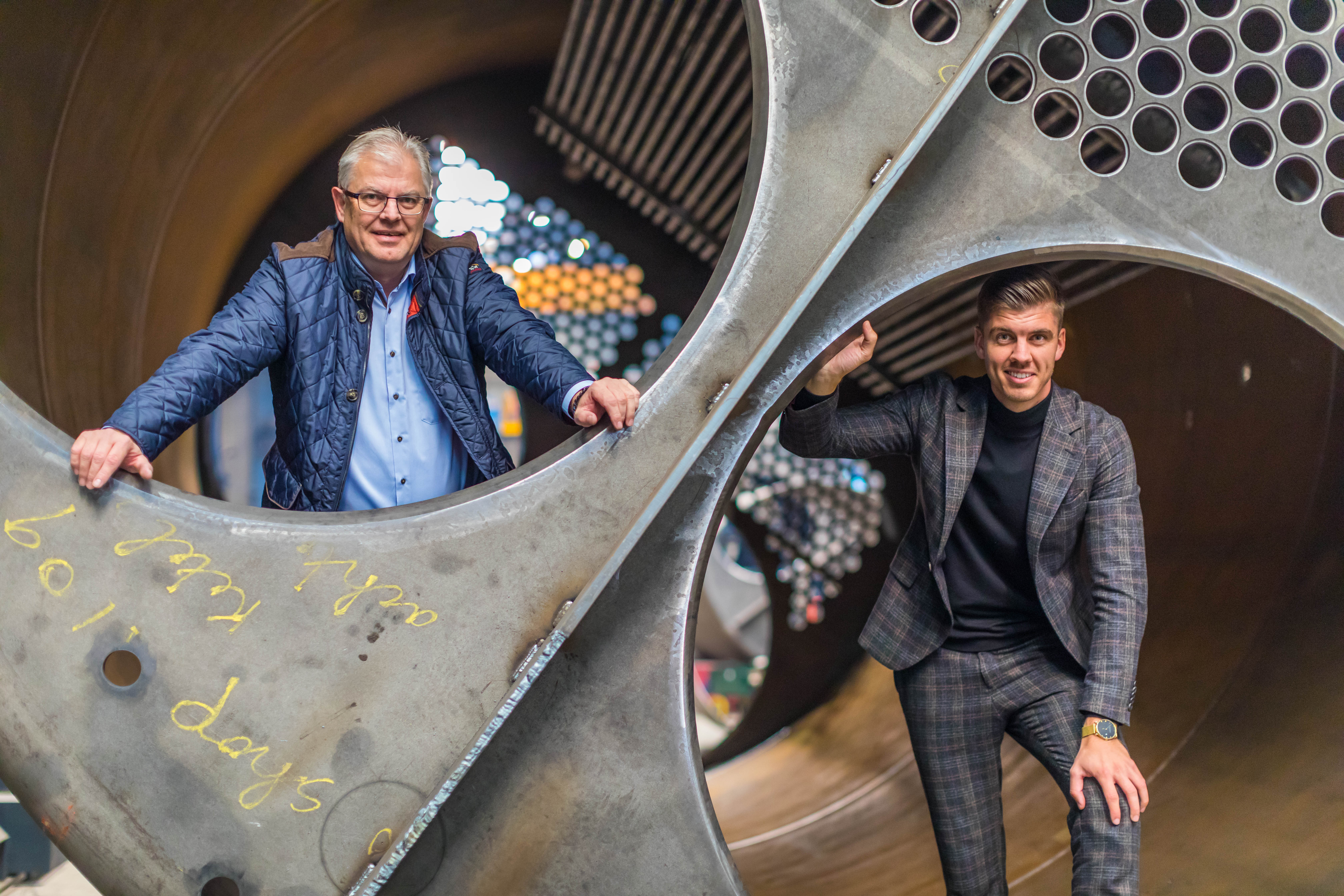 De la roy sitting on a bench